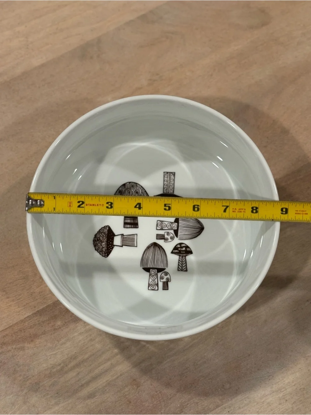 White Ceramic Plate with Small Decorative Sticker